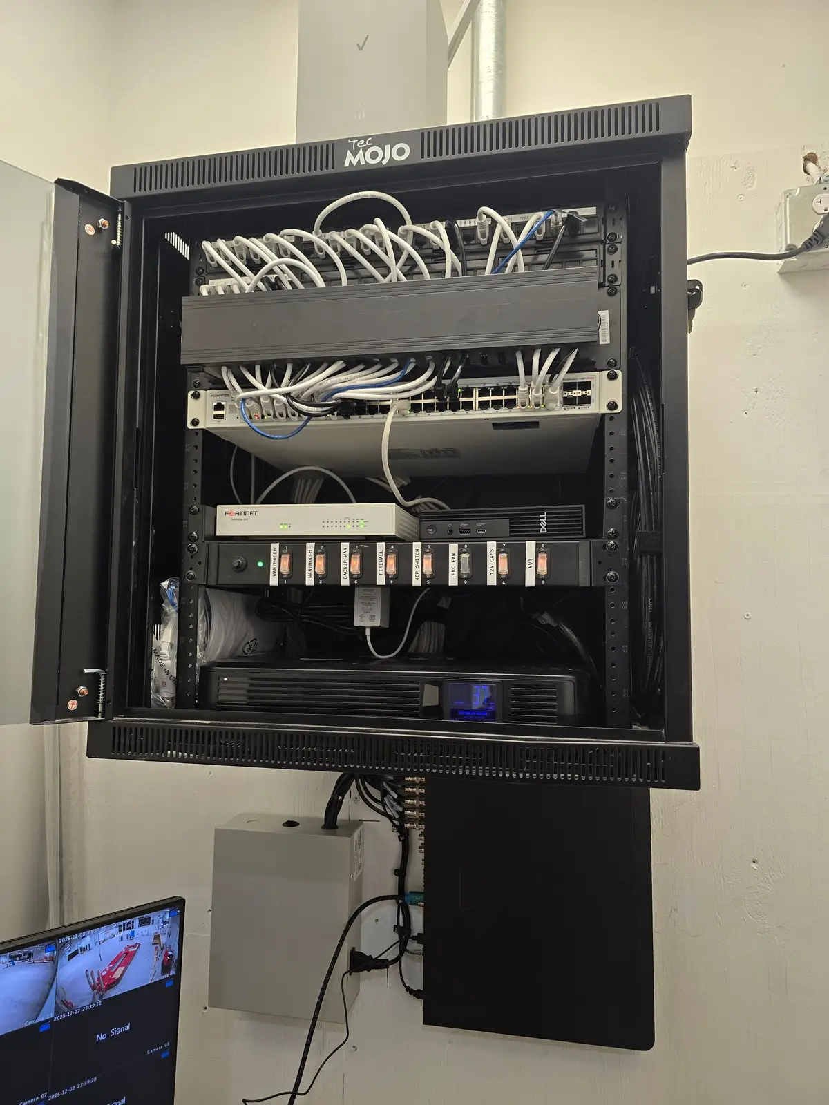 Open network enclosure with neatly patched switch and power